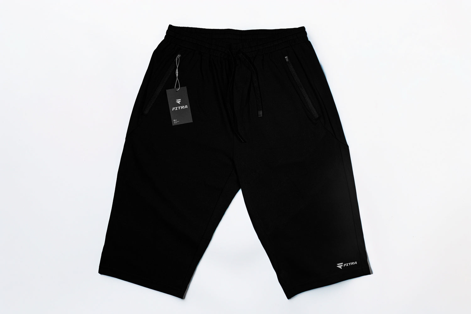 Fitra Core Short in black laid flat, full front view with 14 inch knee-length inseam